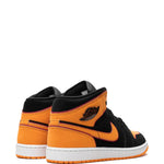 Air Jordan 1 Mid Black Orange Sneakers